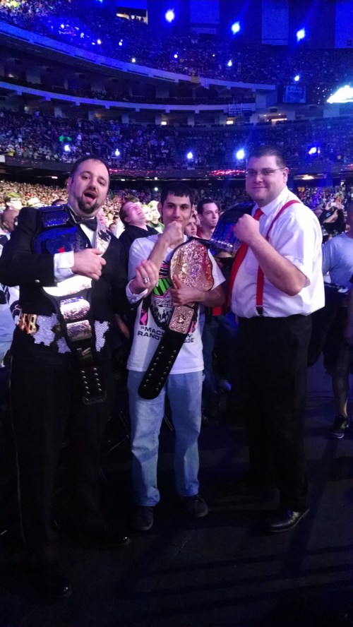 Celebrating victory with the tag team champions, The Million Dollar Man and Irwin R. Schyster.